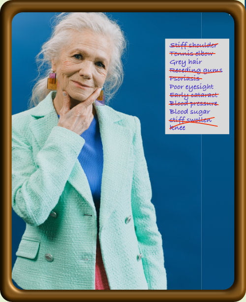 a lady surveying her list of ailments miraculously cured after consuming StemEnhance® Ultra